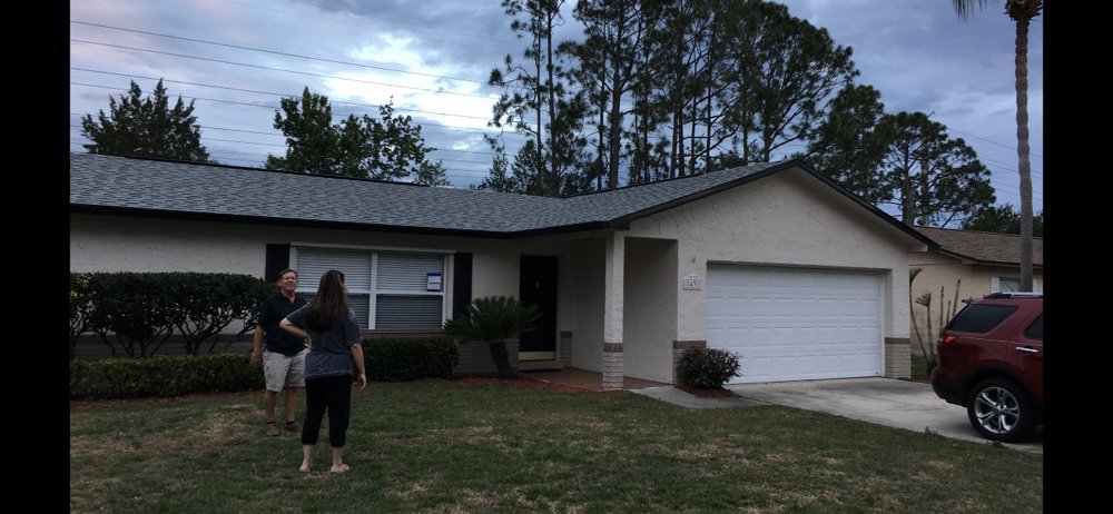Slide of Belcher Roofing