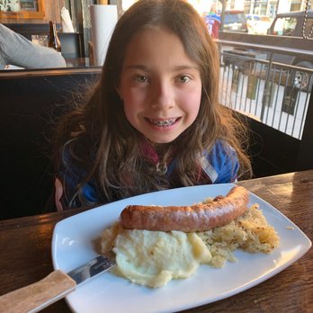 Wally's Wisconsin Tavern - Habanero cheddar knock wurst with kraut and mashed potatoes - American Near Me - Denver, Colorado