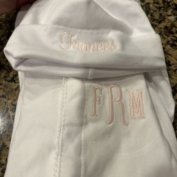 Baby hat with correct font, baby outfit with incorrect monogram