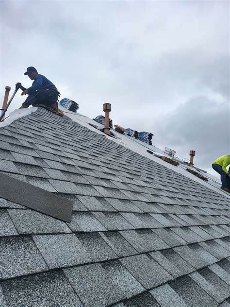 Slide of Top Brass Roofing & Renovations