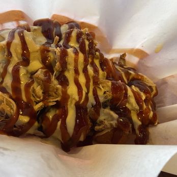 The Brass Tap - Baked Mac and cheese covered with brisket queso and bbq sauce. - Pubs Near Me - Round Rock, Texas The Brass Tap - Baked Mac and cheese covered with brisket queso and bbq sauce. - Pubs Near Me - Round Rock, Texas
