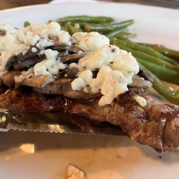 NY steak with bleu cheese and mushrooms.