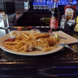 Freddy's Bar & Grill - Fish & Chips served with malt vinegar
