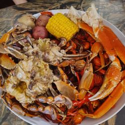 AYCE Crawfish with Snow Crab Legs and Chargrilled Blue Crabs and sides