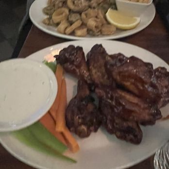 Gossip Bar & Restaurant - Wings n calamari - Irish Pub Near Me - New York, New York