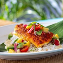 Bahama Breeze - Island Snapper - Seared over white rice, topped with a mango-avocado salsa, pickled red onions and our housemade Key lime butter sauce.