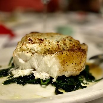 Ruth's Chris Steak House - Close up of my GARLIC CRUSTED SEA BASS - Steakhouses Near Me - Denver, Colorado Ruth's Chris Steak House - Close up of my GARLIC CRUSTED SEA BASS - Steakhouses Near Me - Denver, Colorado