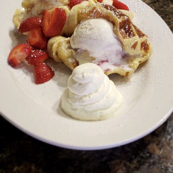 Chicago Waffles - Waffle gelato sandwich - white chocolate raspberry between home made Liege waffles, with a fresh bananas and strawberries and cream - Breakfast & Brunch Near Me - Chicago, Illinois