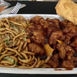 Dinner Combination of Orange Chicken w/ chicken lo mein and an eggroll