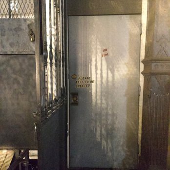 Attaboy - Unassuming door but that is the entrance. Ring the door bell or knock hard. Dated: October 2022 - Cocktail Bars Near Me - New York, New York