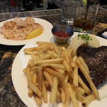 Earls Kitchen + Bar - 8 oz. Surf and Turf Sirloin with mashed potatoes and fries - New American Near Me - McLean, Virginia Earls Kitchen + Bar - 8 oz. Surf and Turf Sirloin with mashed potatoes and fries - New American Near Me - McLean, Virginia