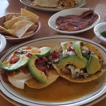 Jarrito Loco - Huevos Charros - basted eggs on a tostada with amazing beans and even better salsa. Very fresh tasting. - Mexican Near Me - Monument, Colorado Jarrito Loco - Huevos Charros - basted eggs on a tostada with amazing beans and even better salsa. Very fresh tasting. - Mexican Near Me - Monument, Colorado
