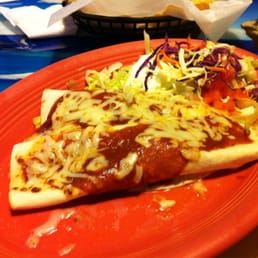 Lunch burrito deluxe. Two chicken and bean burritos topped with red sauce and cheese. Lunch burrito deluxe. Two chicken and bean burritos topped with red sauce and cheese.
