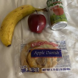 To go breakfast.  Old banana, tiny apple, danish, 5 oz apple juice.  The office has no other options available.