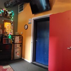 Music Space Studios - Sitting on the couch looking at the front entrance, the office then the doors into the sound room.