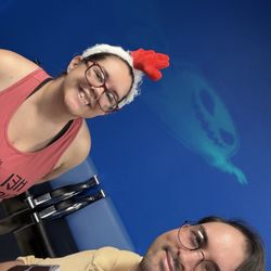 Client who also dressed up for Halloween joining a selfie with her trainer