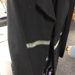 Vision 21 Cleaners - My coat was damaged. The white line is my once leather band!!