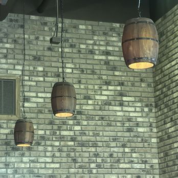 The Hub Eats & Drinks - The decor is such a vibe. Down to the beer barrel sconces and brick wall ! - Sports Bars Near Me - Fresno, California