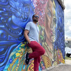 First Friday Art Walks on Santa Fe - Stop to take a fake model-isc photo at a random mural!!!