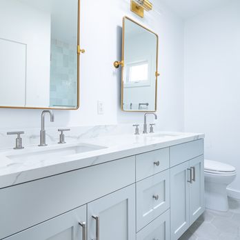 United Firm Construction - a bathroom with two sinks and a toilet - General Contractors Near Me - Pasadena, California United Firm Construction - a bathroom with two sinks and a toilet - General Contractors Near Me - Pasadena, California