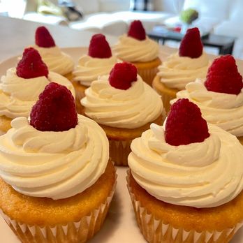 Brew 2 Rescue Cafe - a plate of cupcakes with raspberries on top - Coffee & Tea Near Me - Hertford, North Carolina Brew 2 Rescue Cafe - a plate of cupcakes with raspberries on top - Coffee & Tea Near Me - Hertford, North Carolina