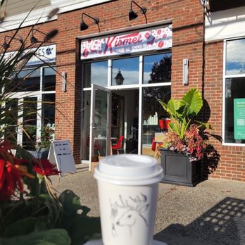 Kismet Coffee - a cup of coffee on a table outside of a coffee shop - Coffee & Tea Near Me - Bay Shore, New York Kismet Coffee - a cup of coffee on a table outside of a coffee shop - Coffee & Tea Near Me - Bay Shore, New York