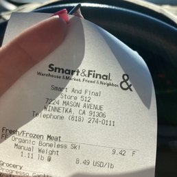 a person holding a receipt a person holding a receipt