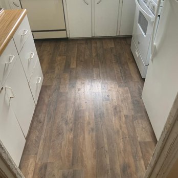 Appleton Residential Services - a kitchen with wood flooring - Handyman Near Me