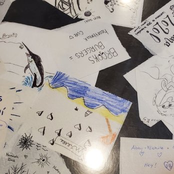 Brooks Burgers - The tables were decorated with notes from customers. - Hot Dogs Near Me - Naples, Florida