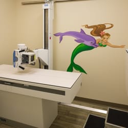 PM Pediatrics Urgent Care - X-ray room for diagnosing broken bones, performing chest x-rays, etc.