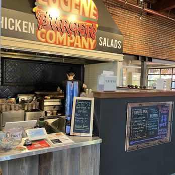 Eugene Burger Company - a counter with a menu on it - Burgers Near Me - Eugene, Oregon