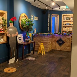 Blunt and Cherry - Display inside with a Mike Tyson cut out decorated for Christmas. December 2021