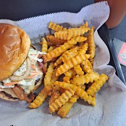 That’s My Dogg - Burger with slaw, bacon, grilled onions and tasty cheese with seasoned fries. So good!