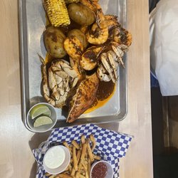 SEA Crab House - Seattle - SEA sauce Boil with side of regular fries.