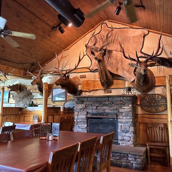 Steve's Dakota Grill - a dining room with deer heads on the wall - American Near Me - Ontario, Ohio Steve's Dakota Grill - a dining room with deer heads on the wall - American Near Me - Ontario, Ohio