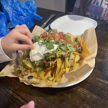 The Raven Bistro - A NACHO VIBE with Chipotle spiced beef & black bean chili - Mediterranean Near Me - Jasper, Alberta The Raven Bistro - A NACHO VIBE with Chipotle spiced beef & black bean chili - Mediterranean Near Me - Jasper, Alberta