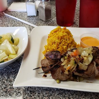 Bala's Bistro - Beef Kabobs, Jollof rice and sauteed veggies - African Near Me - Memphis, Tennessee Bala's Bistro - Beef Kabobs, Jollof rice and sauteed veggies - African Near Me - Memphis, Tennessee