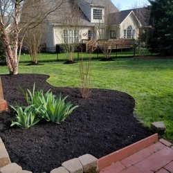 JB Landscaping - Edged, weeded, and mulched beds.