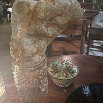 WILD - The entire skin of a pig, fried, and the best corn ever - Cocktail Bars Near Me - Tulum, ROO