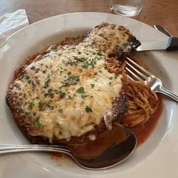 Sorella - Chicken Parmesan over spaghetti - Pizza Near Me - Newport, Oregon Sorella - Chicken Parmesan over spaghetti - Pizza Near Me - Newport, Oregon