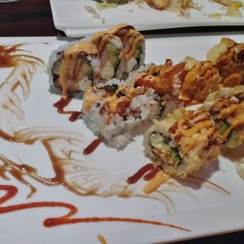 Asian Pop - Specialty Rolls. Not raw.  Hubby won't eat raw fish.  Delicious.  Love the DRAGON plate art. - Sushi Bars Near Me - Ocala, Florida