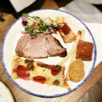 Timbers Table & Kitchen - Another food plate: roast pork loin (carved meat of the day), pizza, chicken nugget, crispy ravioli, fries, salmon, orzo pasta salad - Italian Near Me - Pocono Township, Pennsylvania