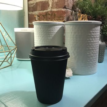 The Potter's House - a coffee cup on a table - Coffee & Tea Near Me - Springfield, Missouri