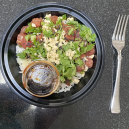Double Ahi Tuna Classic with ginger, cilantro, and tempura.