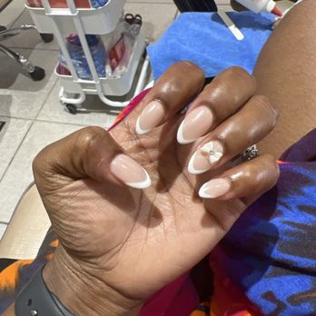 MT Nails And Spa - French tip nail with a bow - Waxing Near Me - Las Vegas, Nevada MT Nails And Spa - French tip nail with a bow - Waxing Near Me - Las Vegas, Nevada