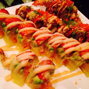 Blue Ginger - Strawberry mango Dragon Roll (left side) and Happiness Roll (on right). Delish!!! - Japanese Near Me - Southwest Ranches, Florida Blue Ginger - Strawberry mango Dragon Roll (left side) and Happiness Roll (on right). Delish!!! - Japanese Near Me - Southwest Ranches, Florida