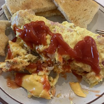 C's Restaurant Bakery and Coffee Shop - Omelette with (sliced cheese) ham and onions. - Bakeries Near Me - Middleton, Wisconsin C's Restaurant Bakery and Coffee Shop - Omelette with (sliced cheese) ham and onions. - Bakeries Near Me - Middleton, Wisconsin