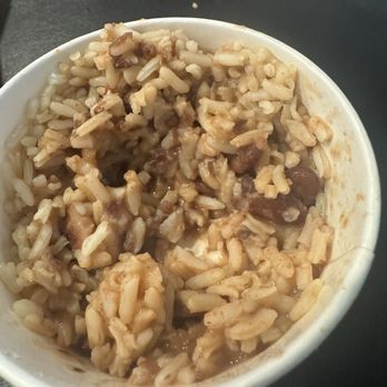 Popeyes Louisiana Kitchen - Rice with a side of red beans. I'm guessing they're trying to stretch the red beans by putting rice in the bottom and top. - Fast Food Near Me - Rosenberg, Texas