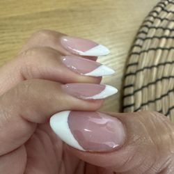 Pretty Q Nails & Spa - The line and the shape was very off and crooked