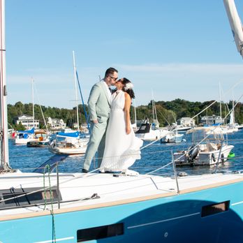 Lisa Mancuso Photography - Bride & Groom on their sailboat in Marblehead, MA harbor. - Session Photography Near Me - Marblehead, Massachusetts Lisa Mancuso Photography - Bride & Groom on their sailboat in Marblehead, MA harbor. - Session Photography Near Me - Marblehead, Massachusetts